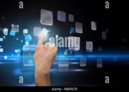 Hand pointing against boxes on technical background Stock Photo