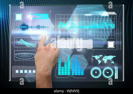Hand pointing against shiny hexagons on black background Stock Photo