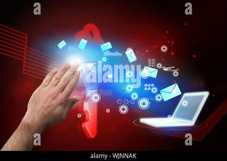 Hand presenting against shiny red key on black background Stock Photo