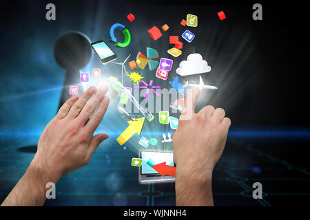 Hands pointing and presenting against keyhole on technological black background Stock Photo
