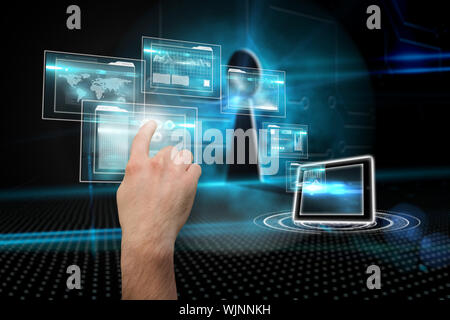 Hand pointing against keyhole on technological background Stock Photo
