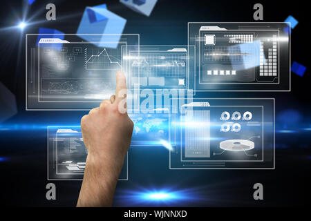 Hand pointing against boxes on technical background Stock Photo