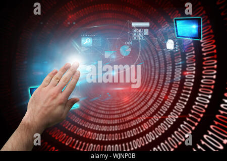 Hand presenting against shiny red binary code on black background Stock Photo