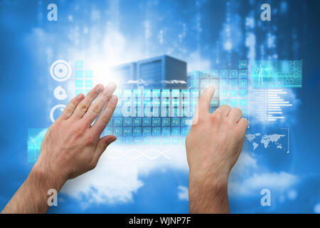 Hands pointing and presenting against cityscape on cloud Stock Photo