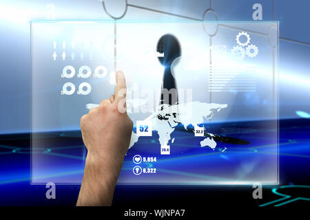 Hand pointing against keyhole on technological background Stock Photo