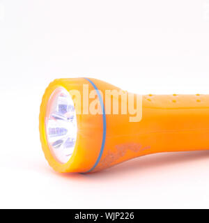 orange flashlight isolated on white background Stock Photo