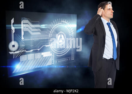 Thinking businessman scratching head against computing interface Stock Photo
