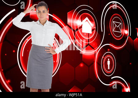 Focused businesswoman against futuristic technology interface Stock Photo