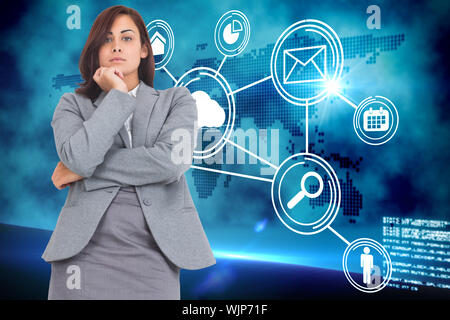 Focused businesswoman against futuristic technology interface Stock Photo
