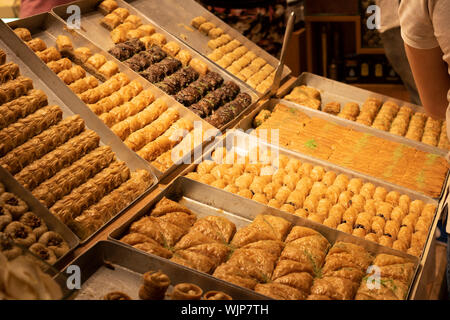 Varieties of local baklava. Taken on the counter in the store. Stock Photo