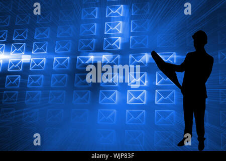 Composite image of glowing envelopes on blue background Stock Photo