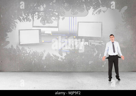 Businessman with empty pockets against splash on wall revealing cloud computing concept Stock Photo