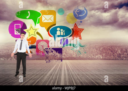 Businessman with empty pockets against splash showing application icons Stock Photo
