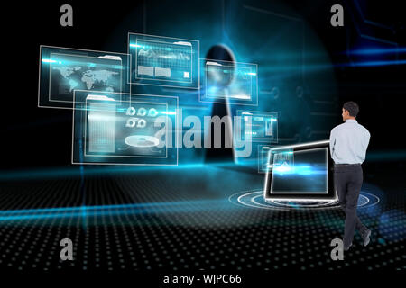 Smiling asian businessman  against keyhole on technological background Stock Photo