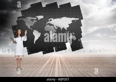 Smiling doctor pointing against screen showing world map Stock Photo