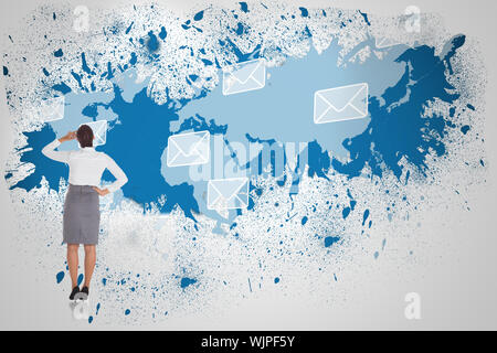 Businesswoman scratching her head against splash on wall revealing email graphic Stock Photo