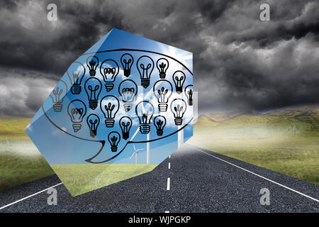 Light bulbs in speech bubble on abstract screen against stormy landscape background with street Stock Photo
