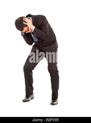 Businessmen scared and terrified to hands over his ears Stock Photo