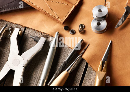 Leather crafting tools still life Stock Photo