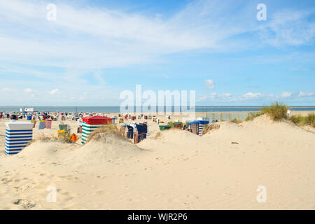 Beach on German wadden island Borkum with typical chairs Stock Photo