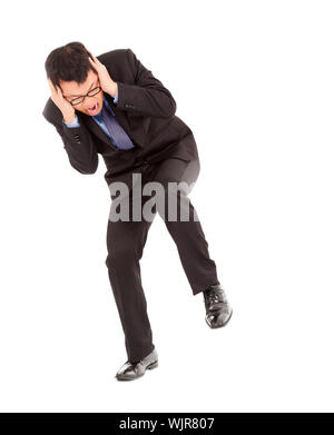 Businessmen terrified to hands over his ears Stock Photo