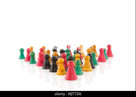 Many vintage pawns in different colors isolated over white Stock Photo