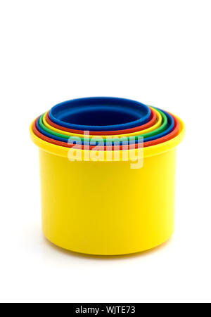 Cups to build a tower as toy for children on white Stock Photo