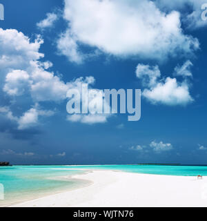 Beautiful island beach with sandspit at Maldives Stock Photo