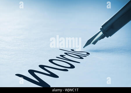 Fountain pen writing the word morals Stock Photo