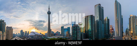 Cityscape panorama of downtown Toronto including iconic skyline features such as the Rogers Centre, CN Tower and Gardiner Expressway among more. Stock Photo