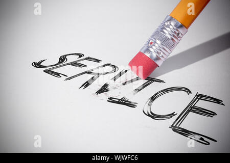 Pencil erasing the word service on paper Stock Photo