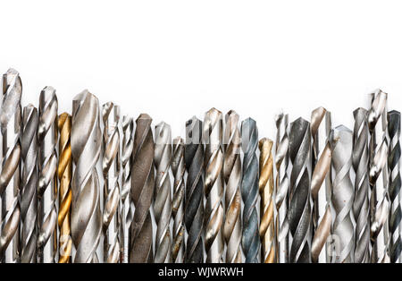 Various used twist drill bits in a row Stock Photo