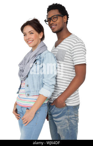 Portrait of a smiling cool young couple over white background Stock Photo