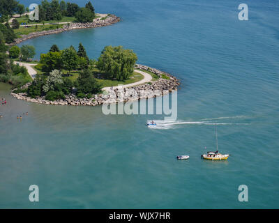 TORONTO - JULY 2018:  The shallow lagoons on the edges of Lake Ontario near the Scarborough Bluffs are popular locations for swimming and boating. Stock Photo