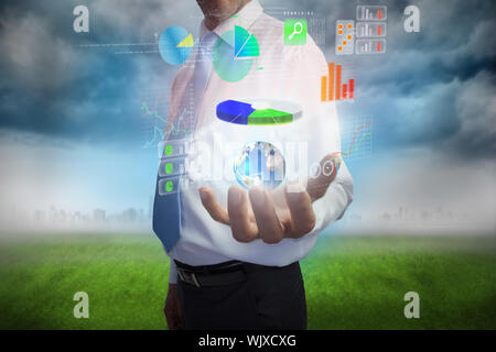 Digital composite of businessman presenting interface Stock Photo