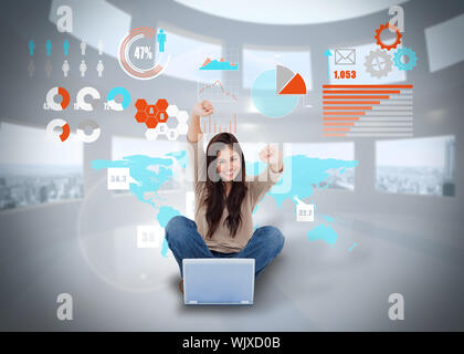 Digital composite of cheering girl using laptop with interface Stock Photo