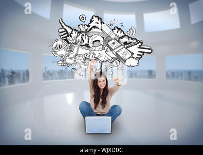 Digital composite of cheering girl using laptop with doodles Stock Photo