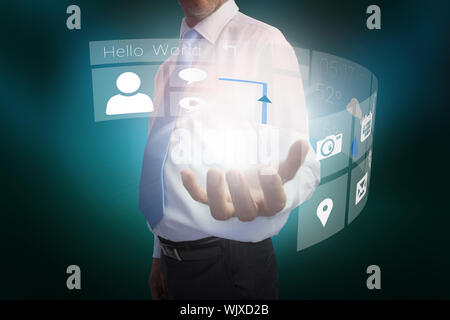 Digital composite of businessman presenting interface Stock Photo