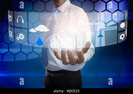 Digital composite of businessman presenting interface Stock Photo