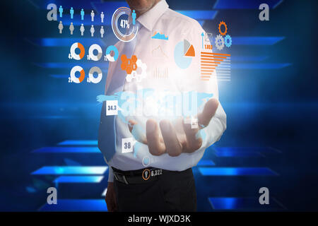 Digital composite of businessman presenting interface Stock Photo