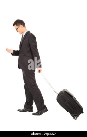 businessman walking and using phone  with briefcase Stock Photo