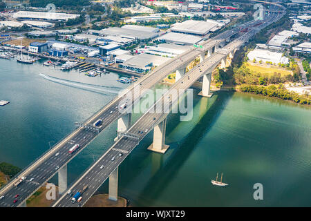 Aerial view of the Sir Leo Hielscher Bridges or Gateway Bridge on the Gateway Motorway M1 in Brisbane, Queensland, QLD, Australia Stock Photo