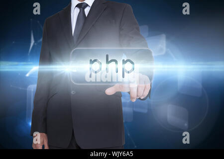The word php and businessman pointing against glowing technological background Stock Photo