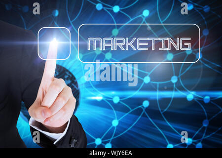 Businesswomans finger touching marketing button against digital earth background Stock Photo