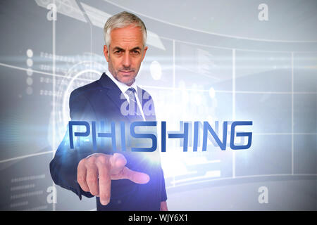 The word phishing and businessman pointing against futuristic technology interface Stock Photo