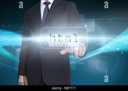 The word html and businessman pointing against abstract glowing black background Stock Photo