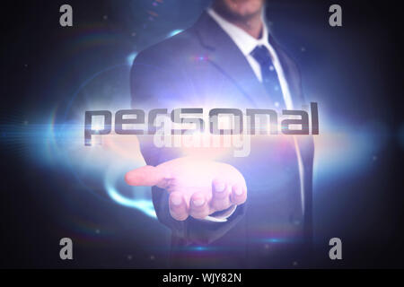 The word personal and businessman presenting against black background with shiny sphere Stock Photo