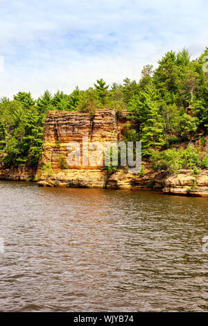 Rock formations along the Wisconsin river are seen by being on an upper dells boat tour. Stock Photo