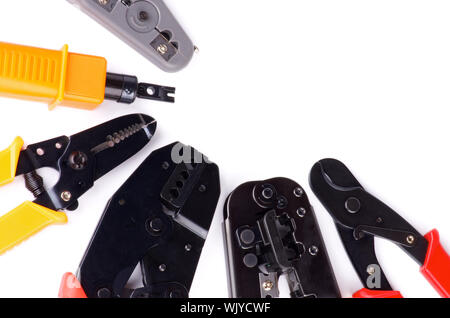 Arrangement of Crimp Tools to attaching Computer Network isolated on White background Stock Photo