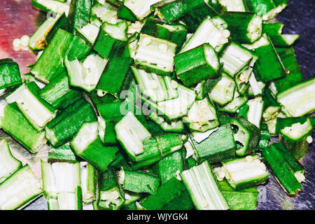 Okra slices image, green and fresh slices of lady’s finger Stock Photo